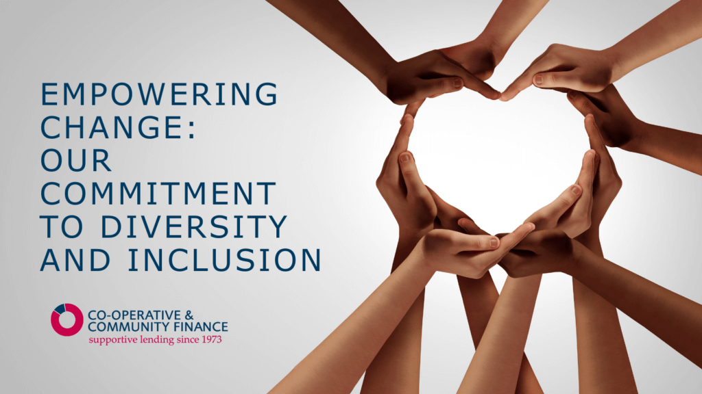 An image comprising text and a photograph. To the right hand side multiple hands of different skin tones are linked so that their fingers coved to form my heart shape. On the left-hand side blue text on a pale background reads empowering change: our commitment to diversity and inclusion. Underneath this is the cooperative community finance.
